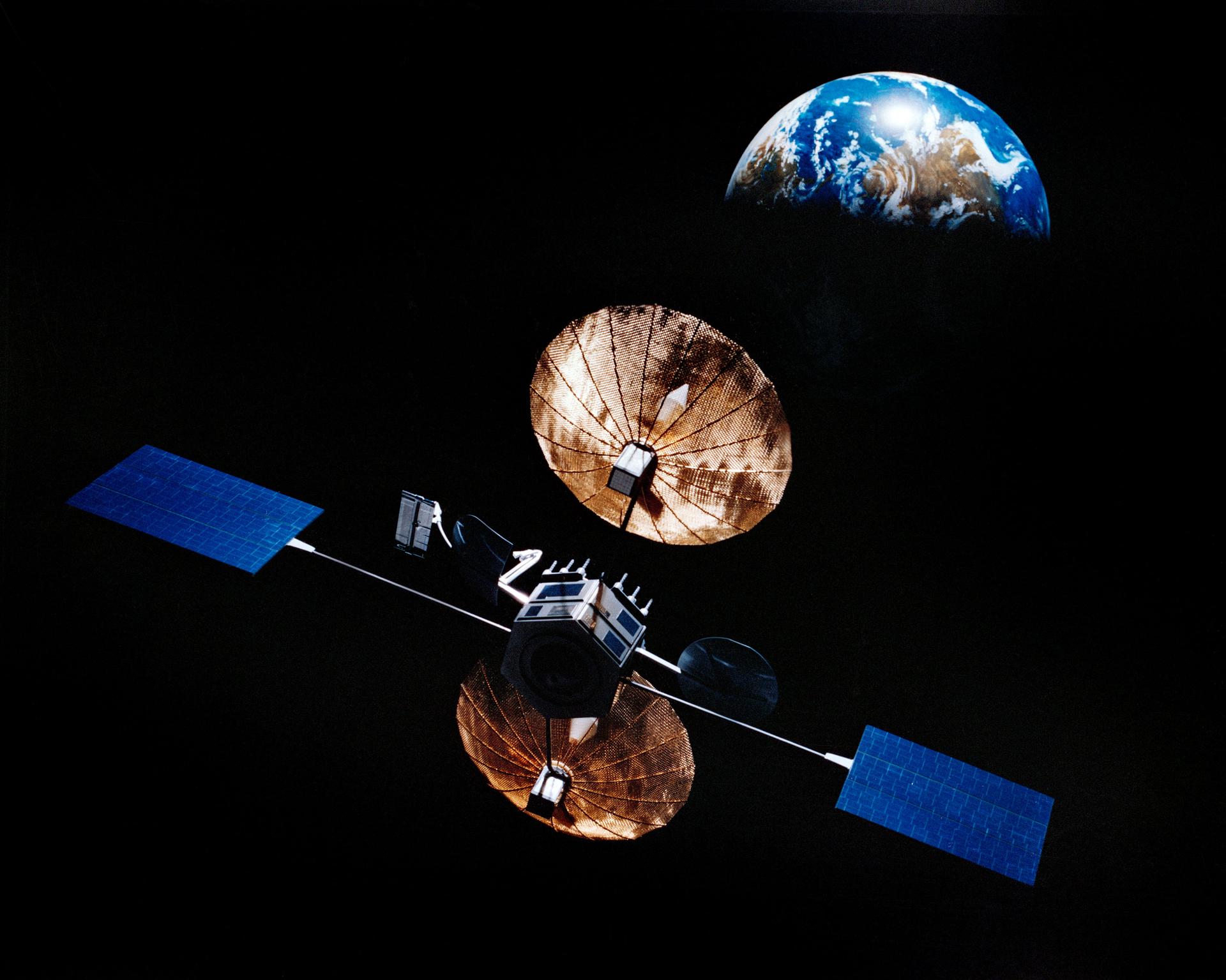 Artist concept of a satellite in orbit above Earth